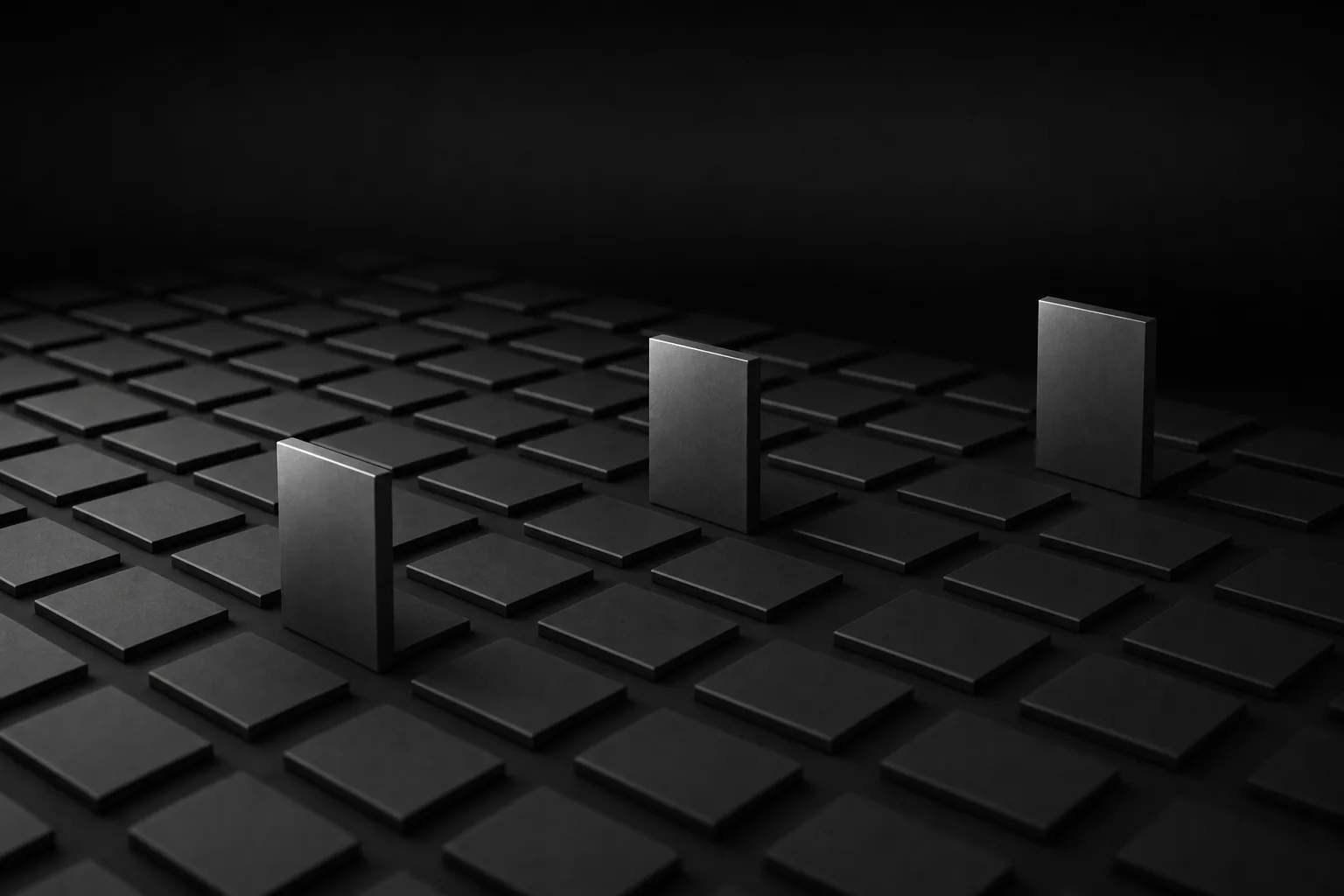 Dark 3D render of a field of thin slabs lying flat in a grid, with exactly three slabs standing upright among them, catching a little more light.